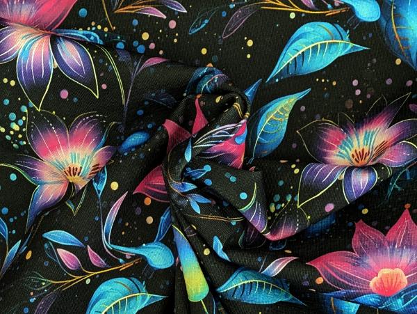 Eigenproduktion Bio Baumwolljersey Fluoreszierender Blütenzauber auf Schwarz Stoff Meterware Kleiderstoff